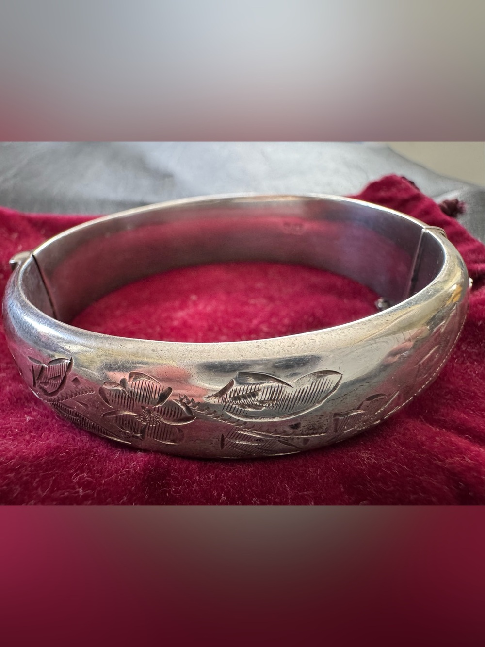 Floral Engraved Silver-Tone Hinge Bracelet with pouch and chain, Juan Sotelo